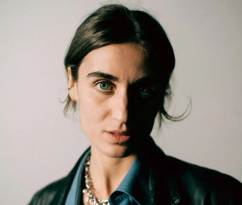 Close portrait, green eyes, leather jacket, Lea Occhi, Arte x Spectrumwaves, 2026. Photo by Iheb Fehri