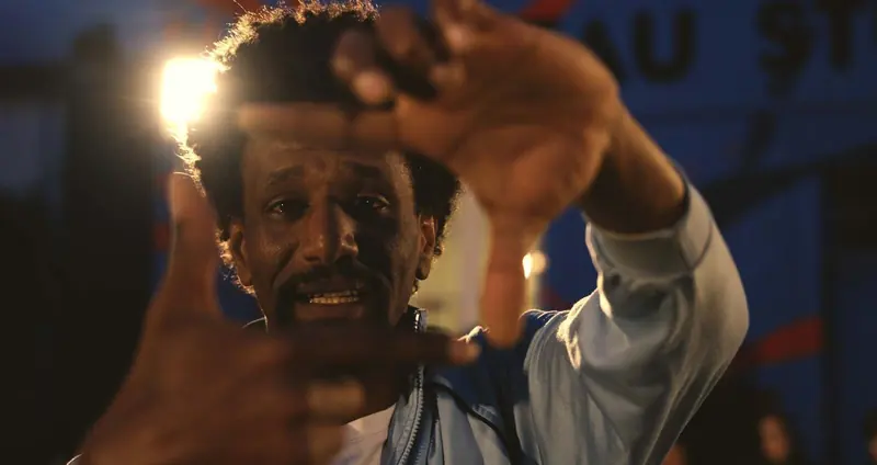 Actor framing the camera with his hands, “Incroyable” - In Carne, Cast to perform while filming one single shot (58 min), Nouveau Studio Théâtre, Nantes, 2026. Photo by Iheb Fehri