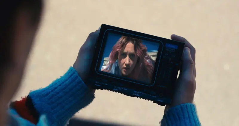 Hands holding a pocket TV, Grain of Sand - Kollision Kourse, music video, Director of photography, Paris, 2026. Photo by Iheb Fehri