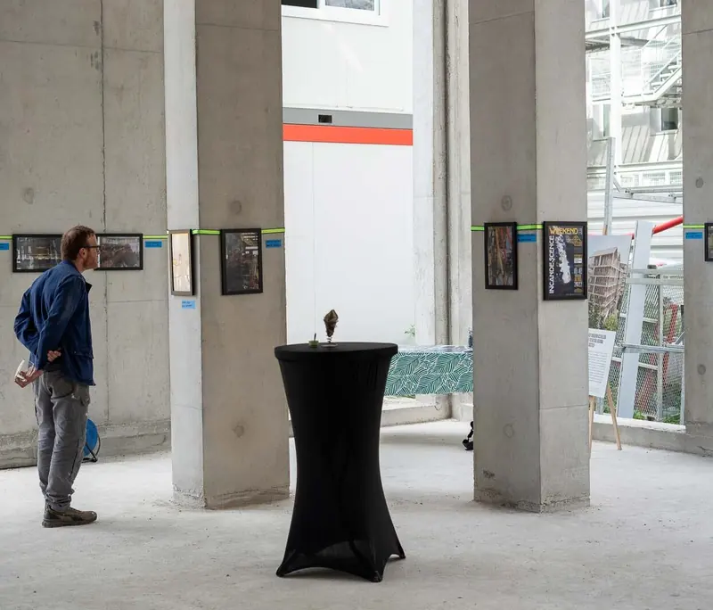 Framed prints on concrete pillars. Photo by Iheb Fehri